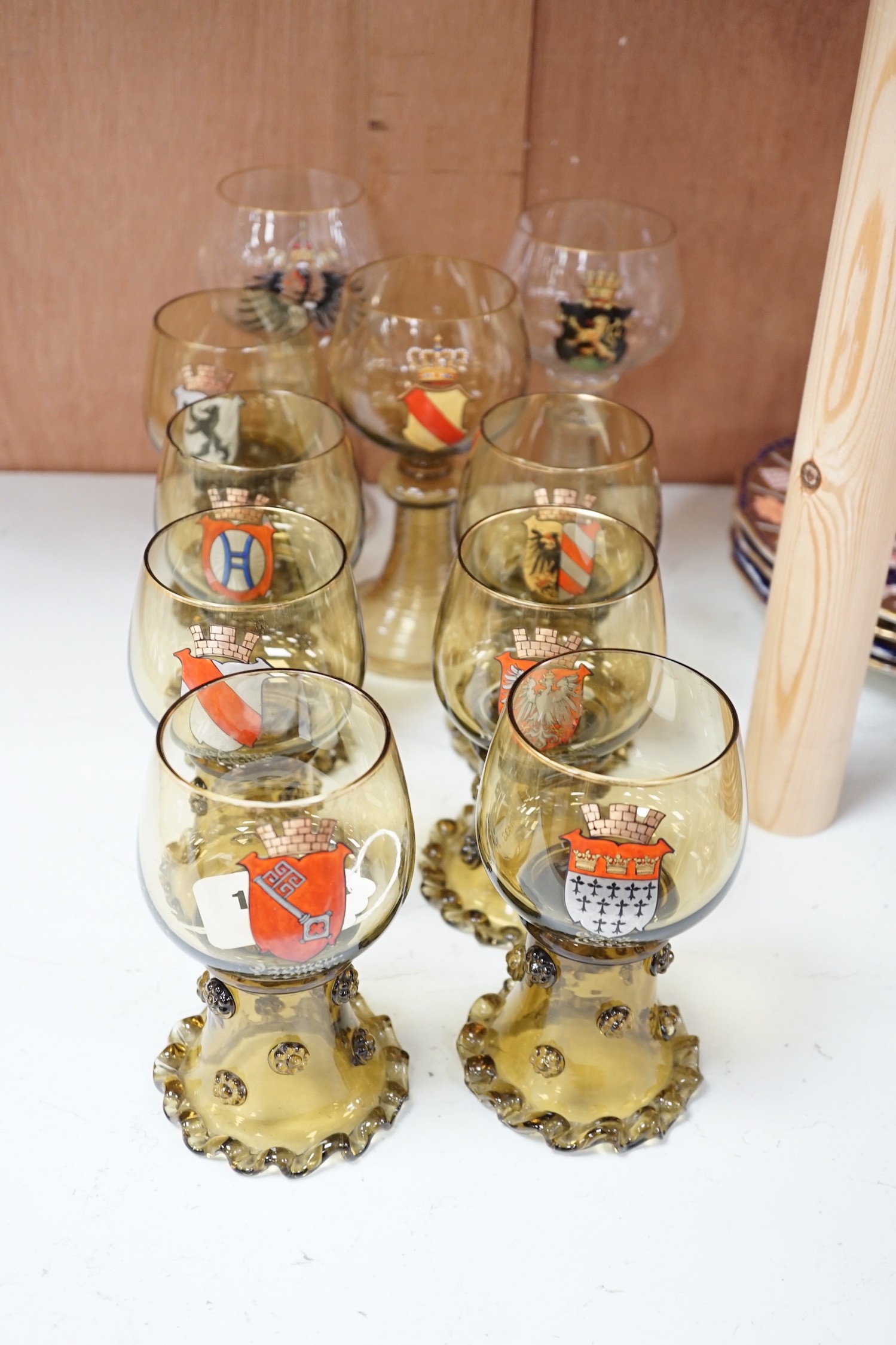 A set of six German enamelled green hock glasses, another larger hock glass and a pair of similar clear hock glasses (10)
